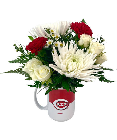 red sports mug with red and white floral arrangement