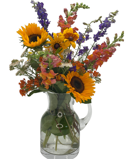 colorful farm fresh flowers in glass vase