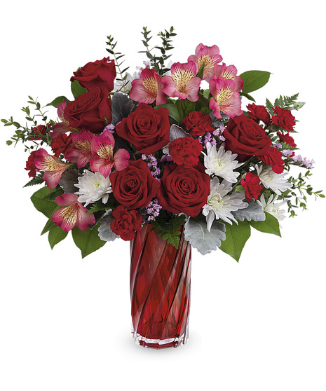 red and pink floral arrangement with roses, alstroemerias, mums, and so much more