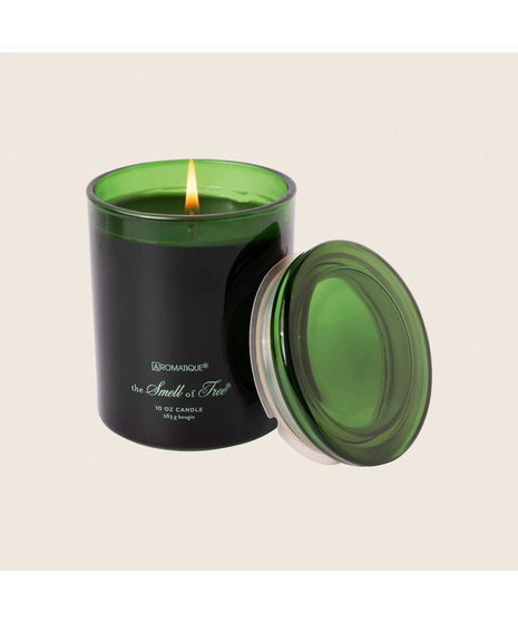 colored aromatic candle on a neutral white background